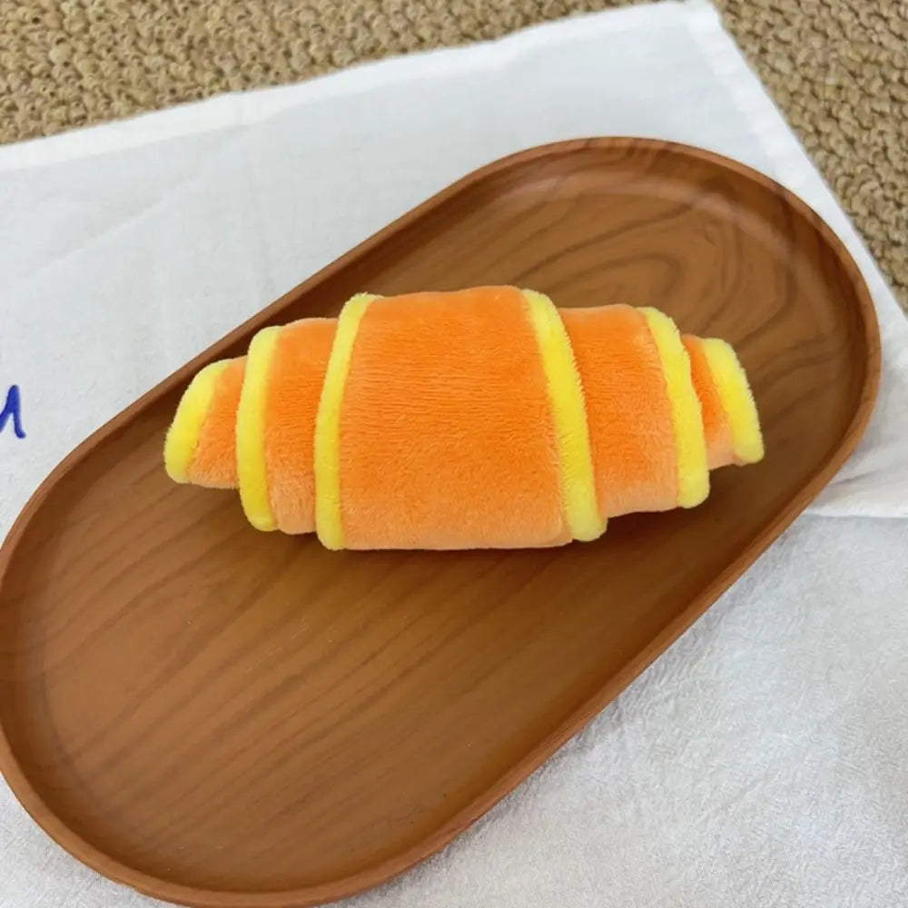 Juguete Croissant de Peluche Dispensador de Premios para Perros