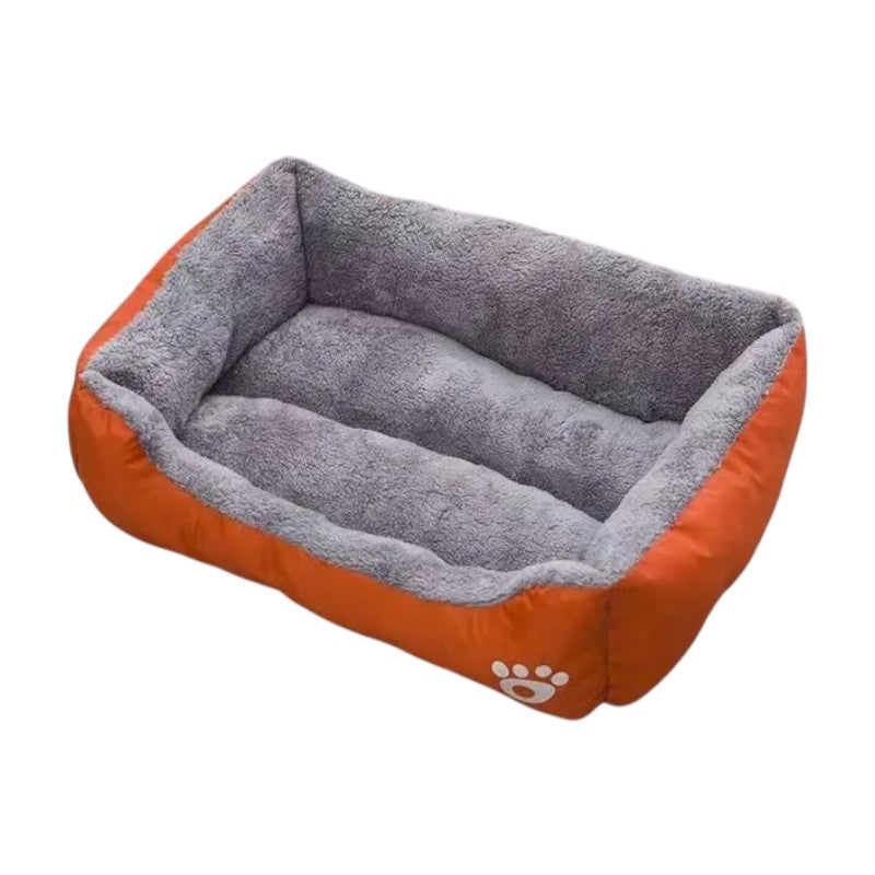 Cama impermeable naranja para perros: comodidad y protección sin límites